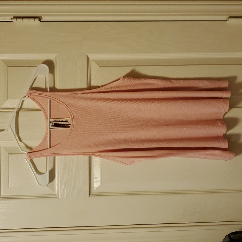 Free People Long Beach ribbed swing tank top in pink. 